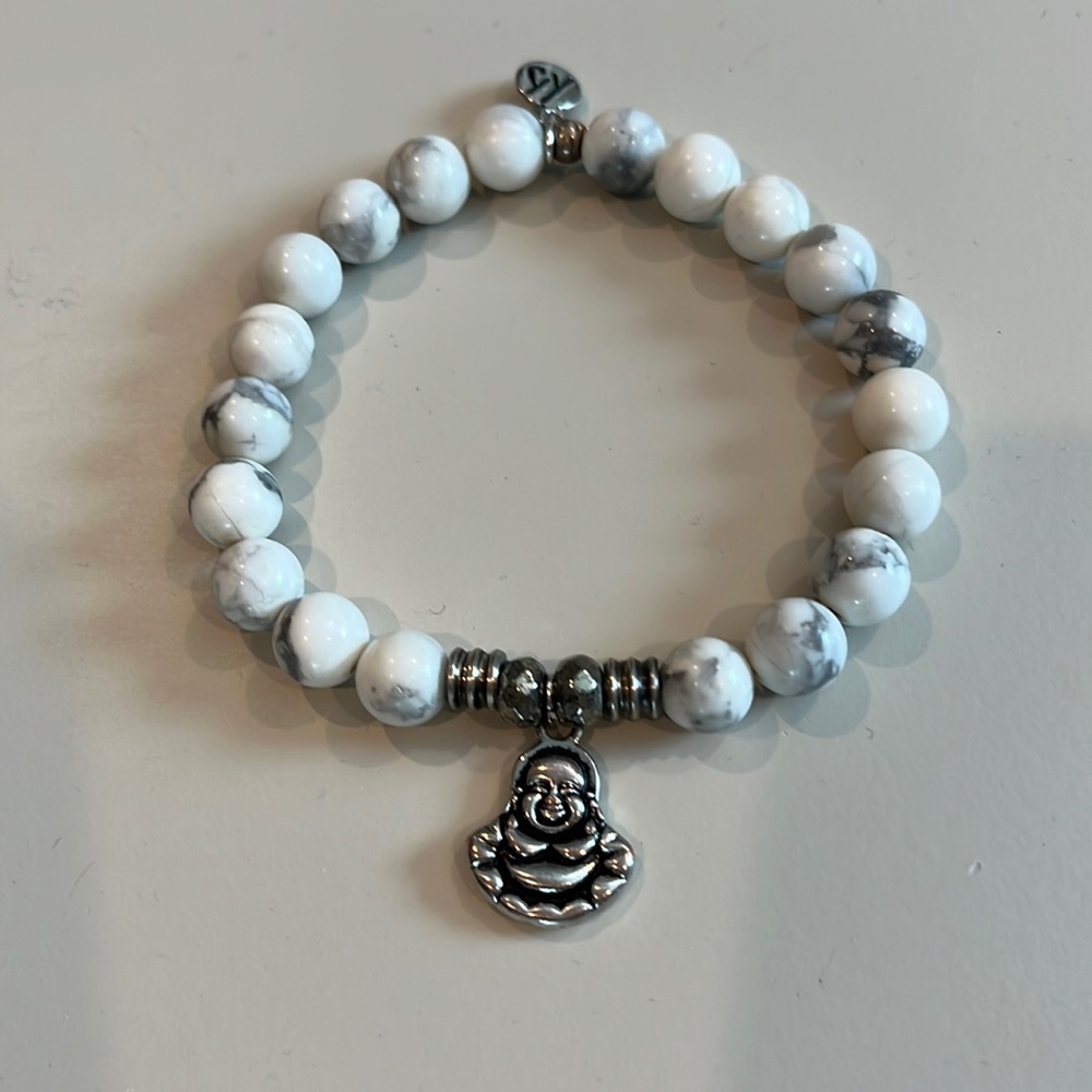 Stretch bracelet with silver Buddha charm